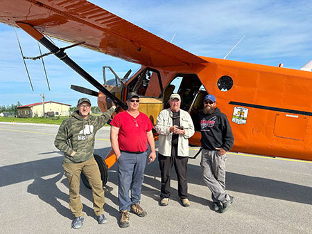 Mike Ebinger the asisstant area biologist  at McGrath Al Barrette pilot Bruce Dale and Nate Pamperin in McGrath with the Fish and Game 1951 DeHavilland Beaver